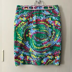 Talbots sz 8 green floral pencil skirt. Zips in back. Slit to back, painted look